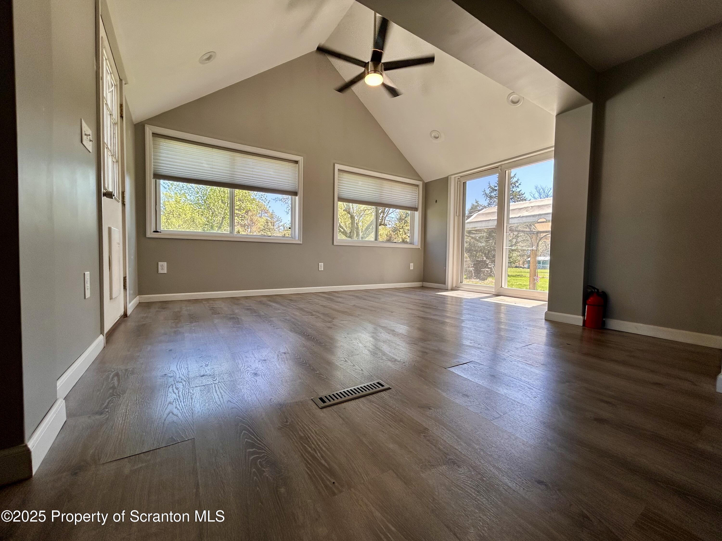 4 East Lemon Road Tunkhannock, PA 18657 - Photo 21 of 25 an empty room with wooden floor and windows
