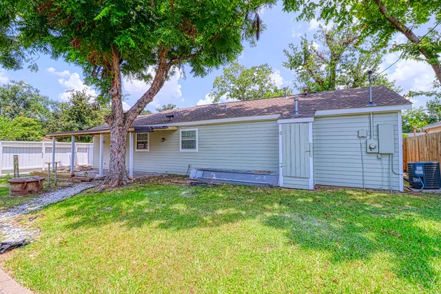 a view of a backyard with a small cabin