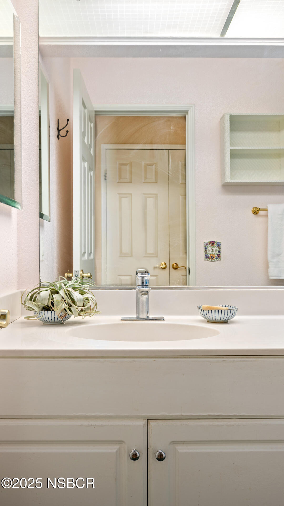 258 Dairyland Road Buellton, CA 93427 - Photo 11 of 19 a bathroom with a sink and a mirror