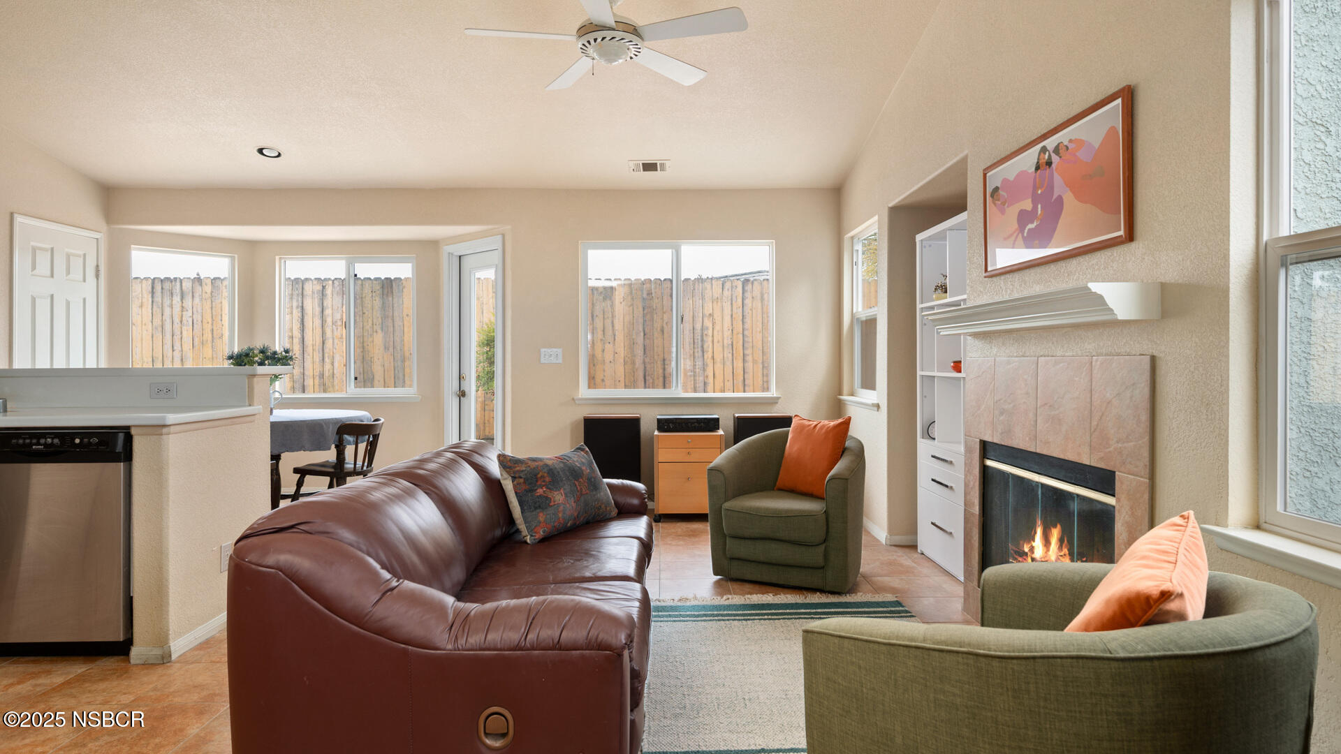 258 Dairyland Road Buellton, CA 93427 - Photo 4 of 19 a living room with furniture a fireplace and a flat screen tv