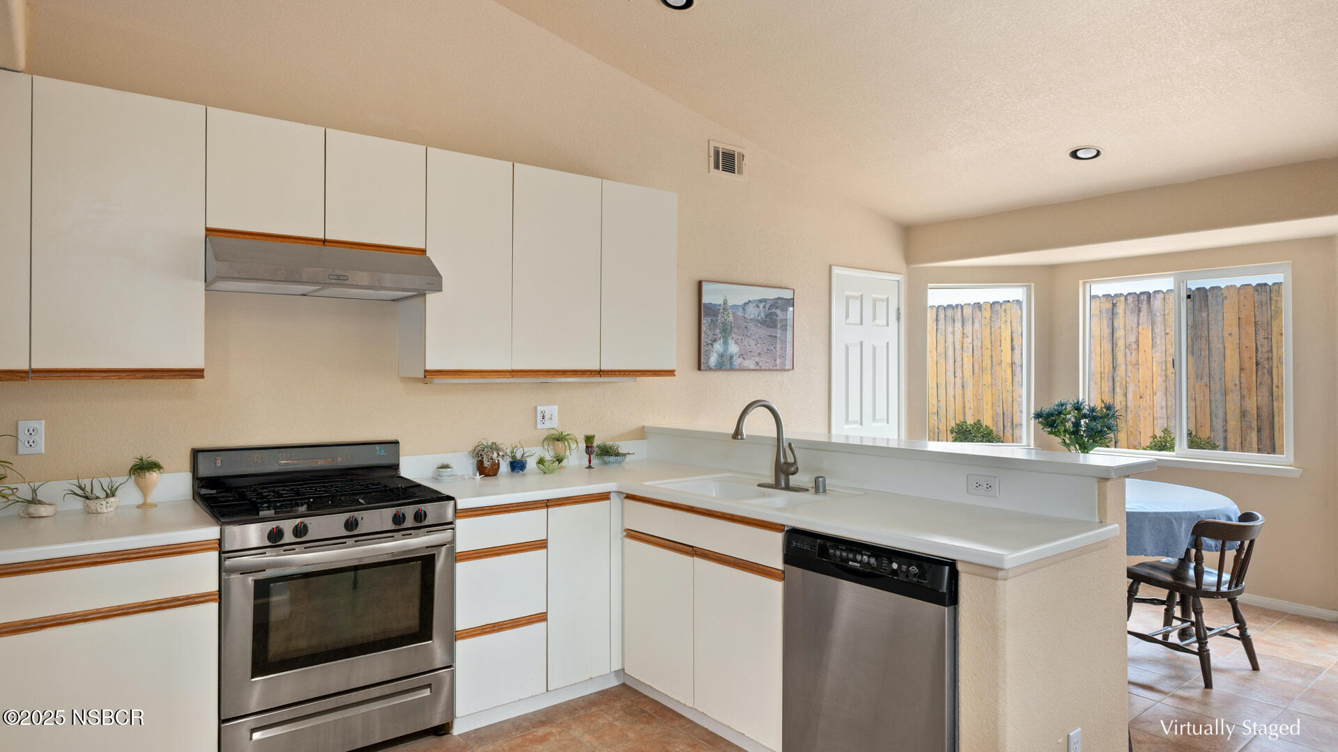 258 Dairyland Road Buellton, CA 93427 - Photo 5 of 19 a kitchen with stainless steel appliances a sink stove and cabinets