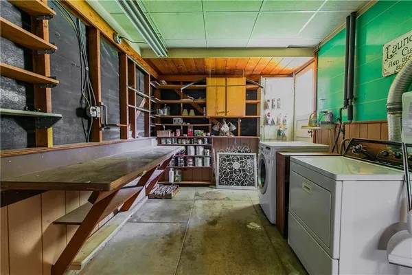 a room with lots of furniture and a sink