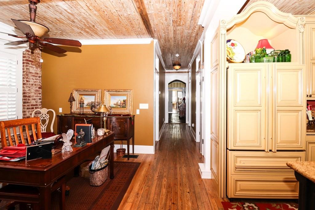 114 North 3rd Avenue Chatsworth, GA 30705 - Photo 19 of 59 a view of a room with wooden floor and windows