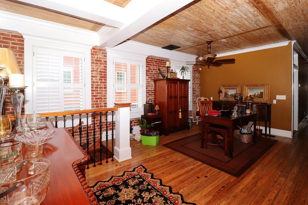 114 North 3rd Avenue Chatsworth, GA 30705 - Photo 21 of 59 a living room with furniture and wooden floor