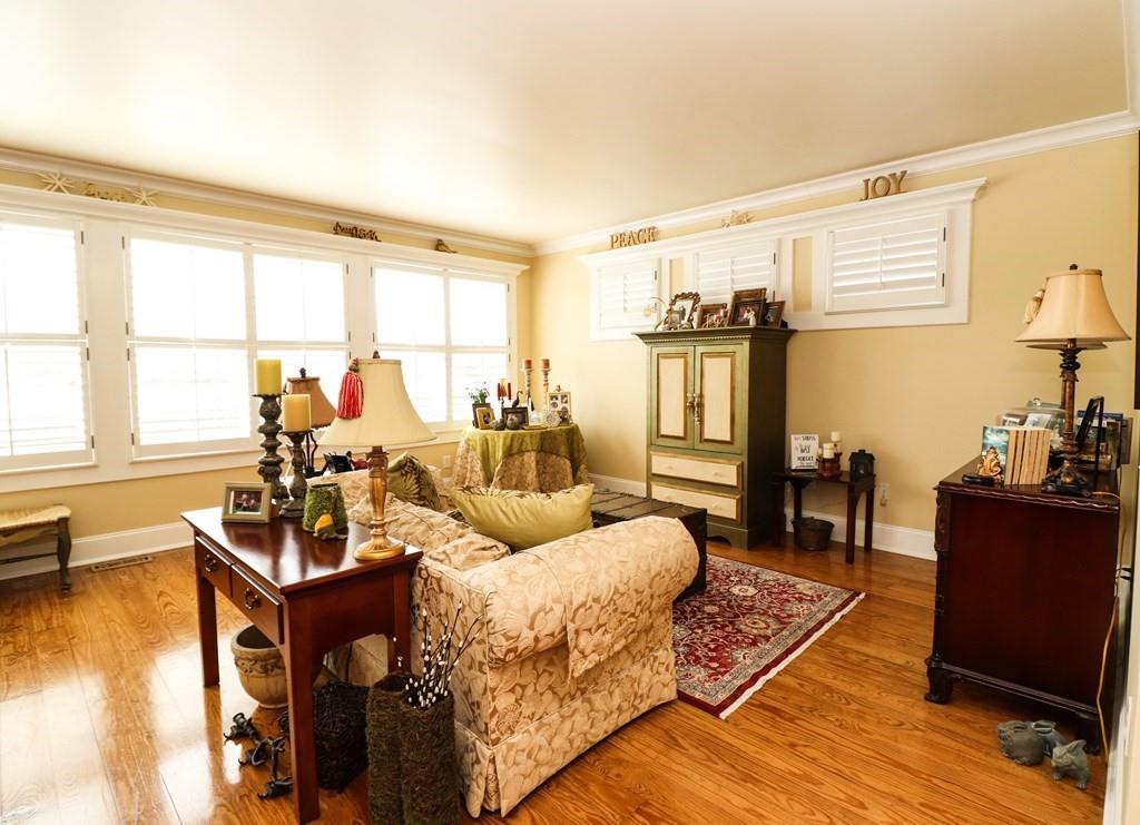 114 North 3rd Avenue Chatsworth, GA 30705 - Photo 39 of 59 a living room with furniture and a window