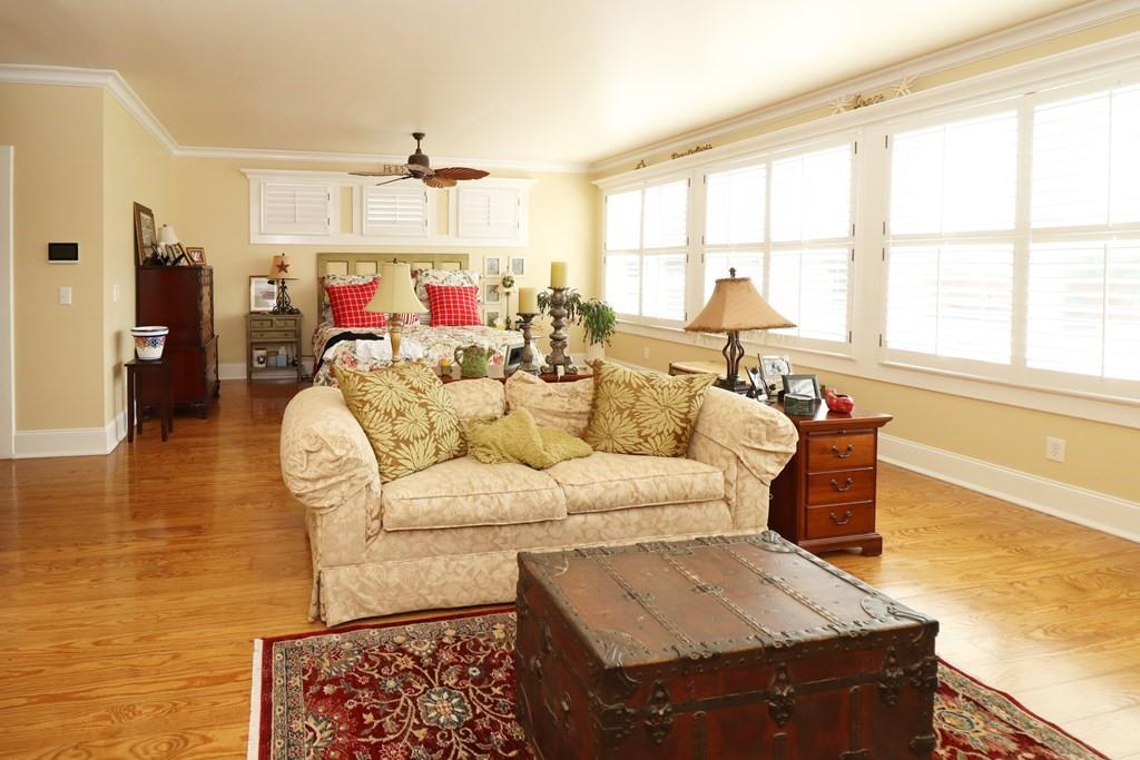 114 North 3rd Avenue Chatsworth, GA 30705 - Photo 40 of 59 a living room with furniture and a large window