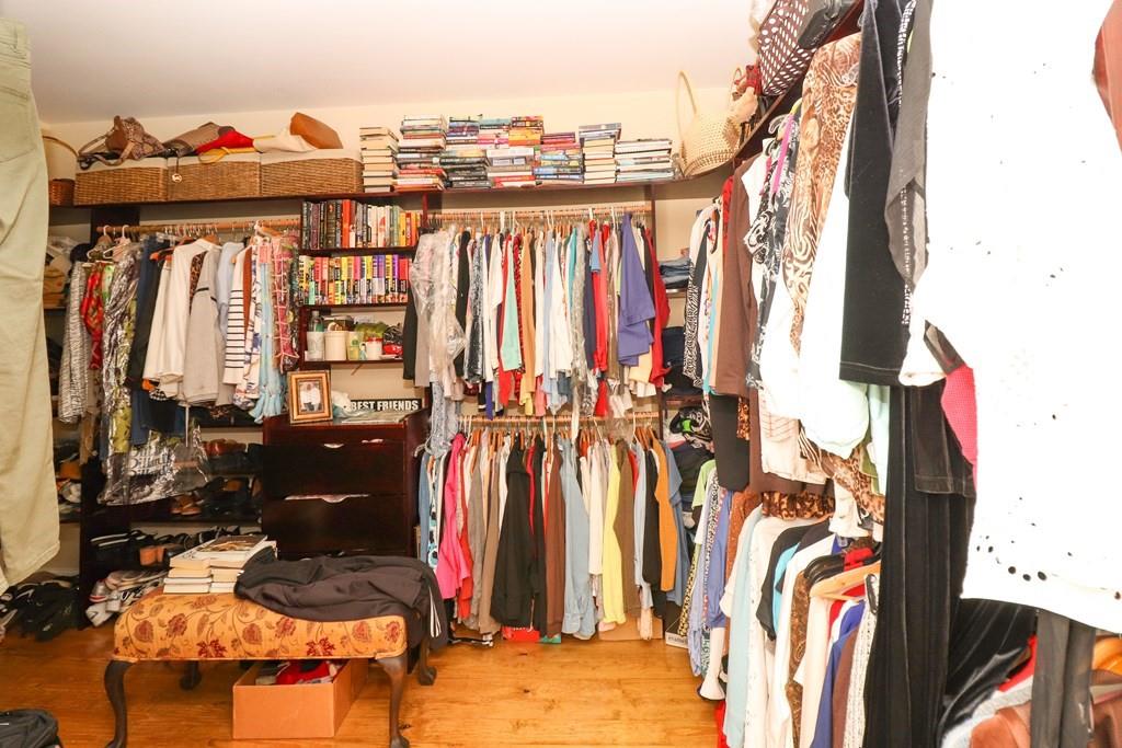 114 North 3rd Avenue Chatsworth, GA 30705 - Photo 44 of 59 a view of walk in closet with clothes and shoes