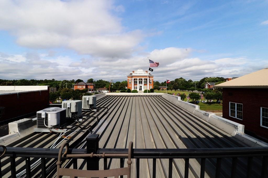114 North 3rd Avenue Chatsworth, GA 30705 - Photo 49 of 59 a view of a balcony with wooden floor