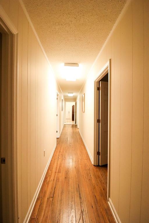 114 North 3rd Avenue Chatsworth, GA 30705 - Photo 57 of 59 a view of a hallway with wooden floor