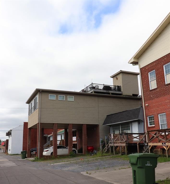 114 North 3rd Avenue Chatsworth, GA 30705 - Photo 58 of 59 a front view of a building with street