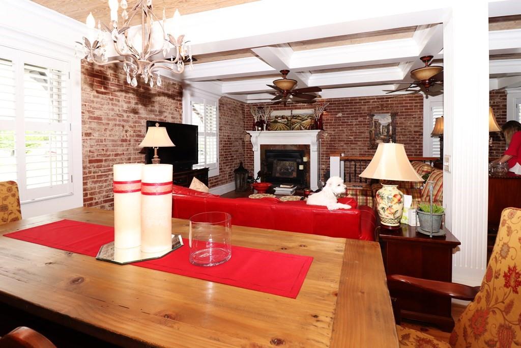 114 North 3rd Avenue Chatsworth, GA 30705 - Photo 9 of 59 a living room with furniture and a fireplace