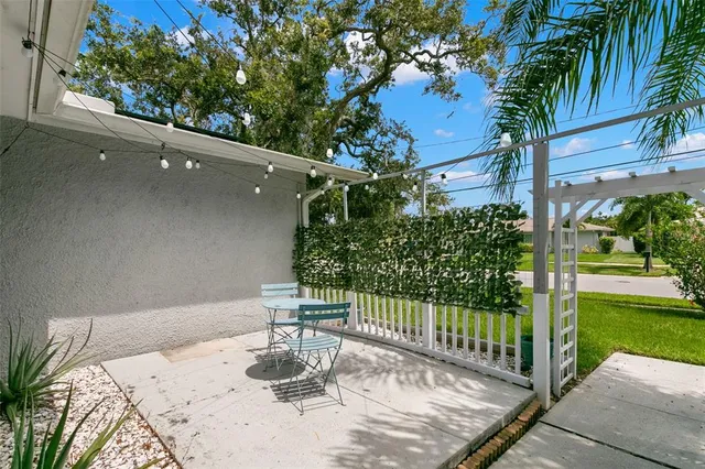 a view of a porch with a bench