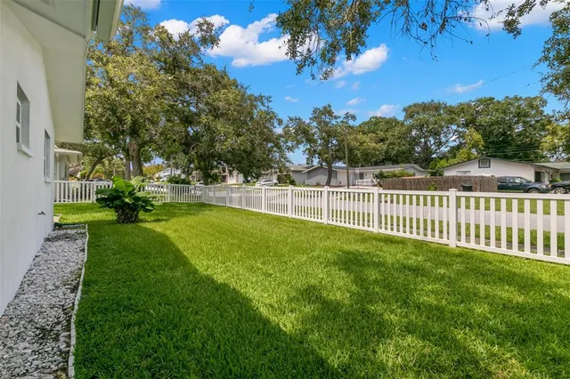 a view of a backyard with a garden