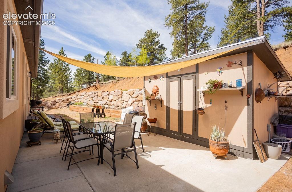 45 Valley Circle Divide, CO 80814 - Photo 28 of 42 a view of a chairs and table in the patio