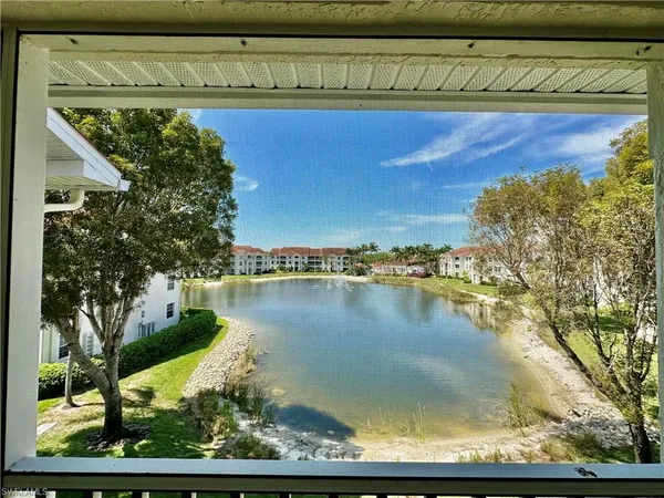 a view of a lake from a balcony