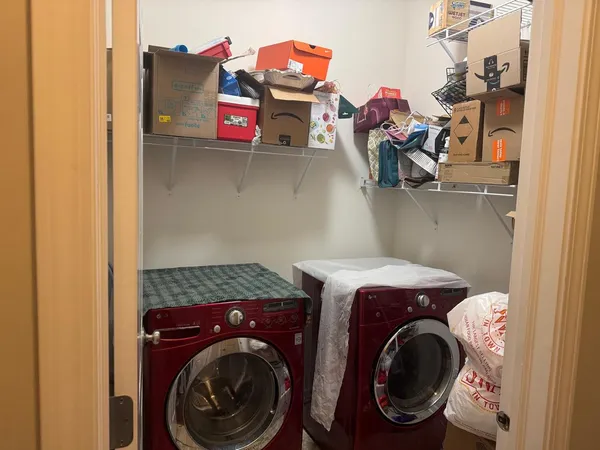 a utility room with dryer and washer