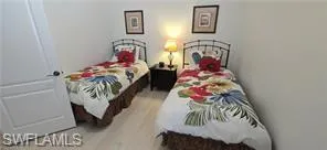 a bedroom with furniture and a bathtub