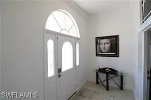 a view of a livingroom with furniture and window