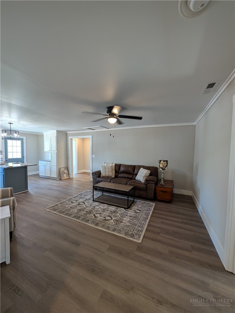 68 Estep Street Sparta, NC 28675 - Photo 15 of 21 a living room with furniture and wooden floor