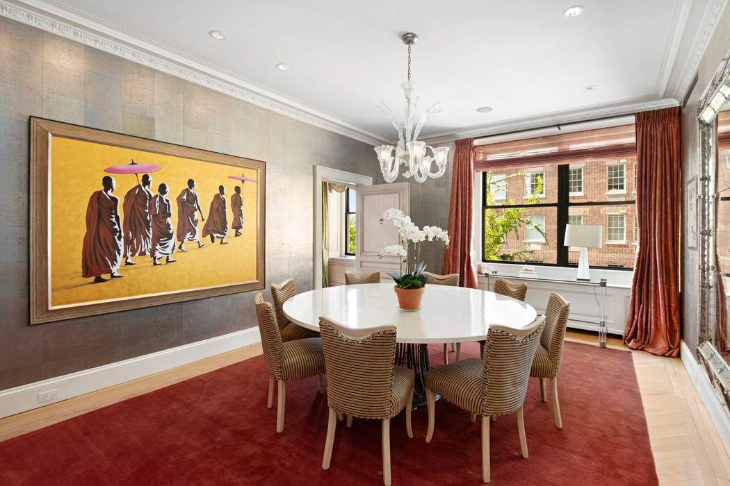 1 Sutton Place South, Unit 7C Manhattan, NY 10022 - Photo 6 of 16 a view of a dining room with furniture window and wooden floor