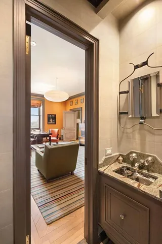 a kitchen with a stove and a window