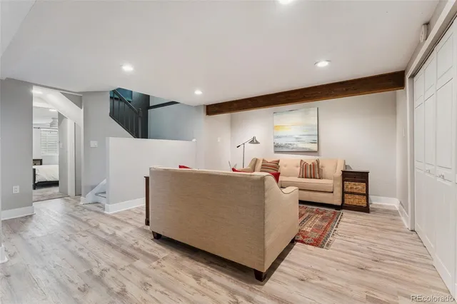 a living room with furniture and a couch