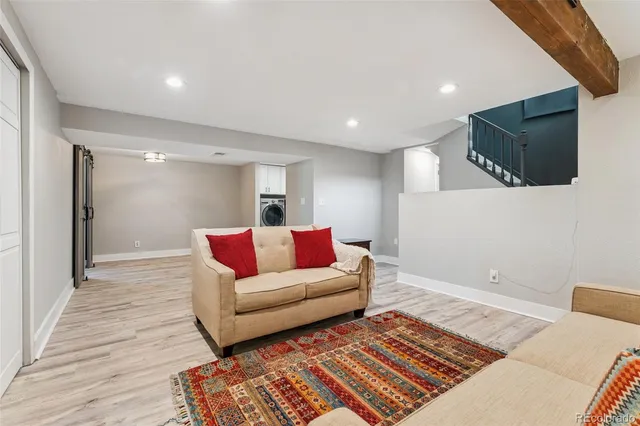 a view of a storage & utility room with wooden floor