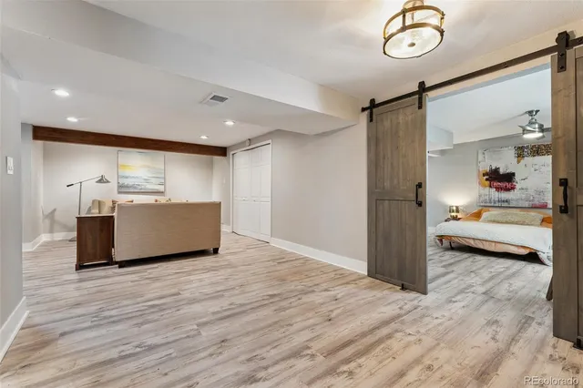 a bathroom with a shower and a sink