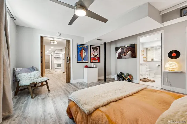 a bedroom with a bed and a table in it