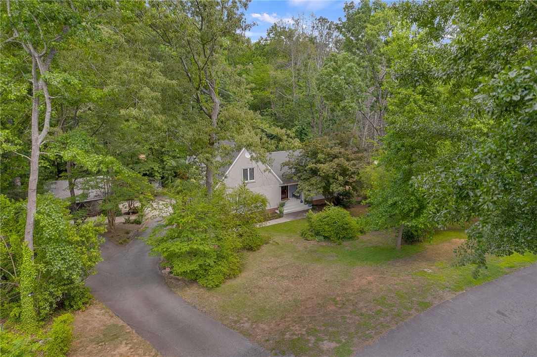 218 Northridge Drive Anderson, SC 29621 - Photo 48 of 50 Nestled among a verdant canopy, this home offers tranquil privacy with a meandering paved driveway.