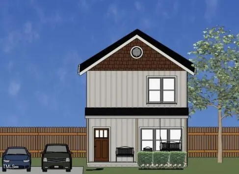 a view of a house with a small yard