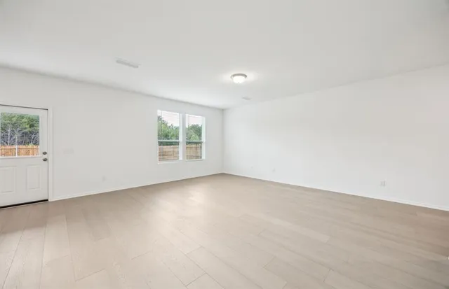 an empty room with a window