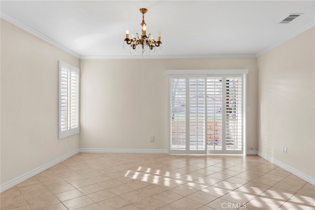 19055 Stoddard Way Apple Valley, CA 92308 - Photo 13 of 44 a view of an empty room with a window