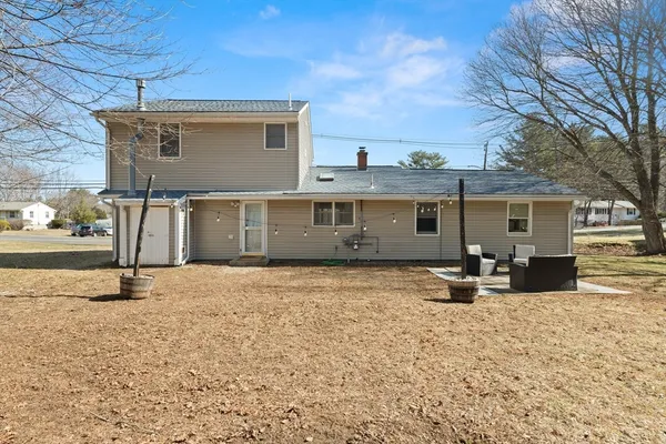 a front view of a house with outdoor space