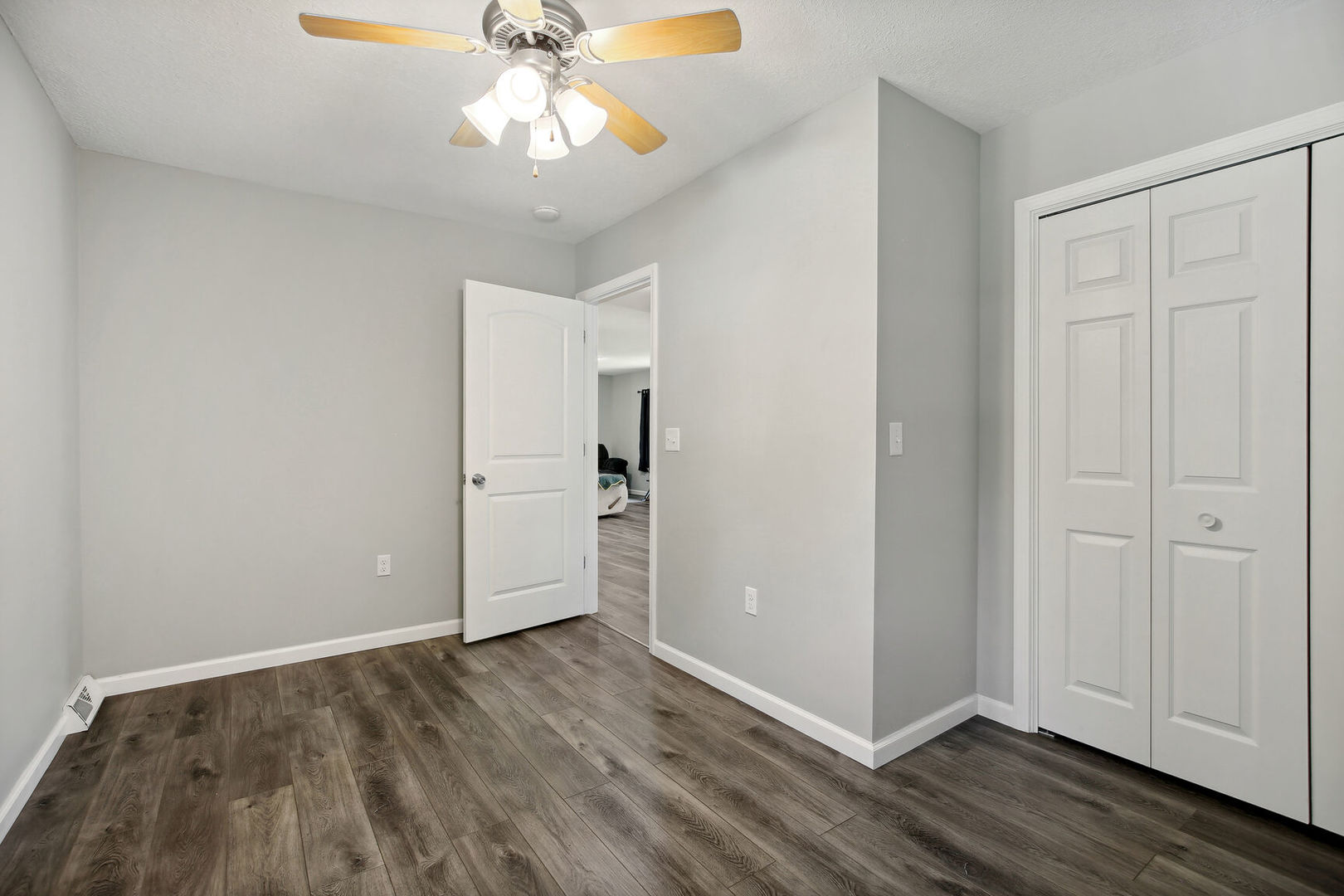 119 South Maple Street Paxton, IL 60957 - Photo 13 of 22 a view of an empty room and wooden floor