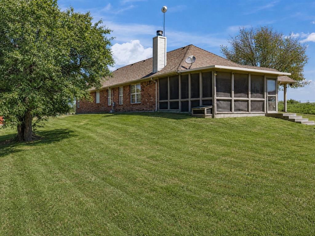 768 Longbranch Drive Decatur, TX 76234 - Photo 35 of 39 **GRASS IS AI Generated to be green**