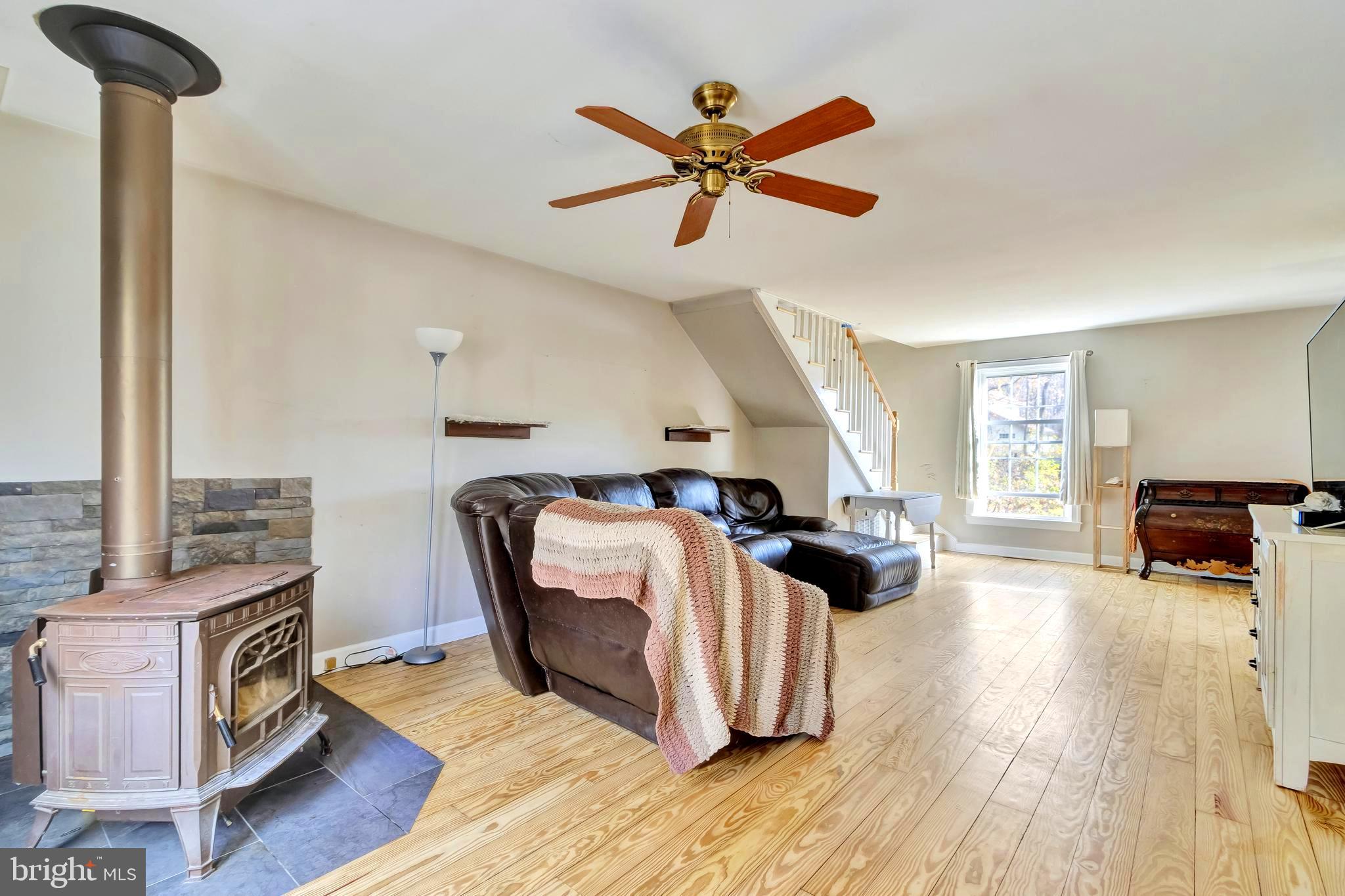 18526 Cool Spring Road Milton, DE 19968 - Photo 16 of 70 a living room with furniture and a wooden floor