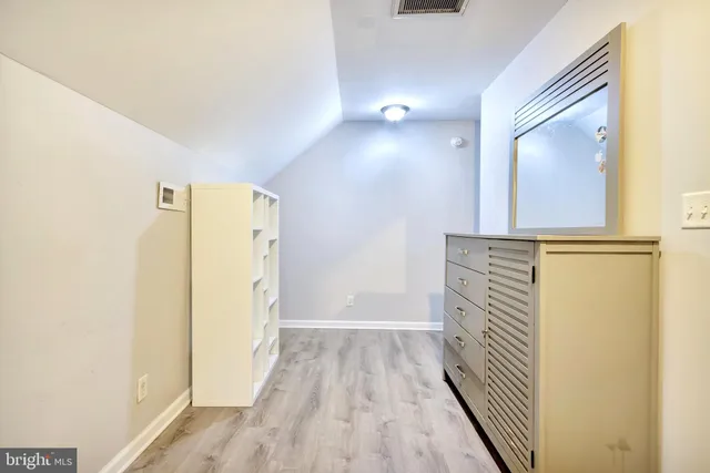 a view of a bathroom from the hallway