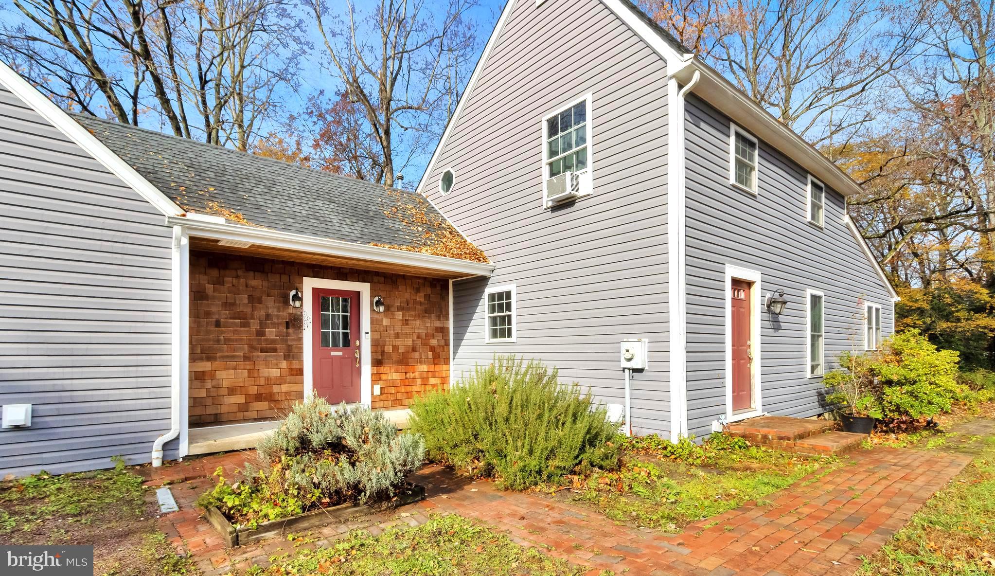 18526 Cool Spring Road Milton, DE 19968 - Photo 45 of 70 a front view of a house with garden