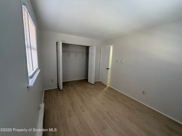 a view of a livingroom with furniture and a couch