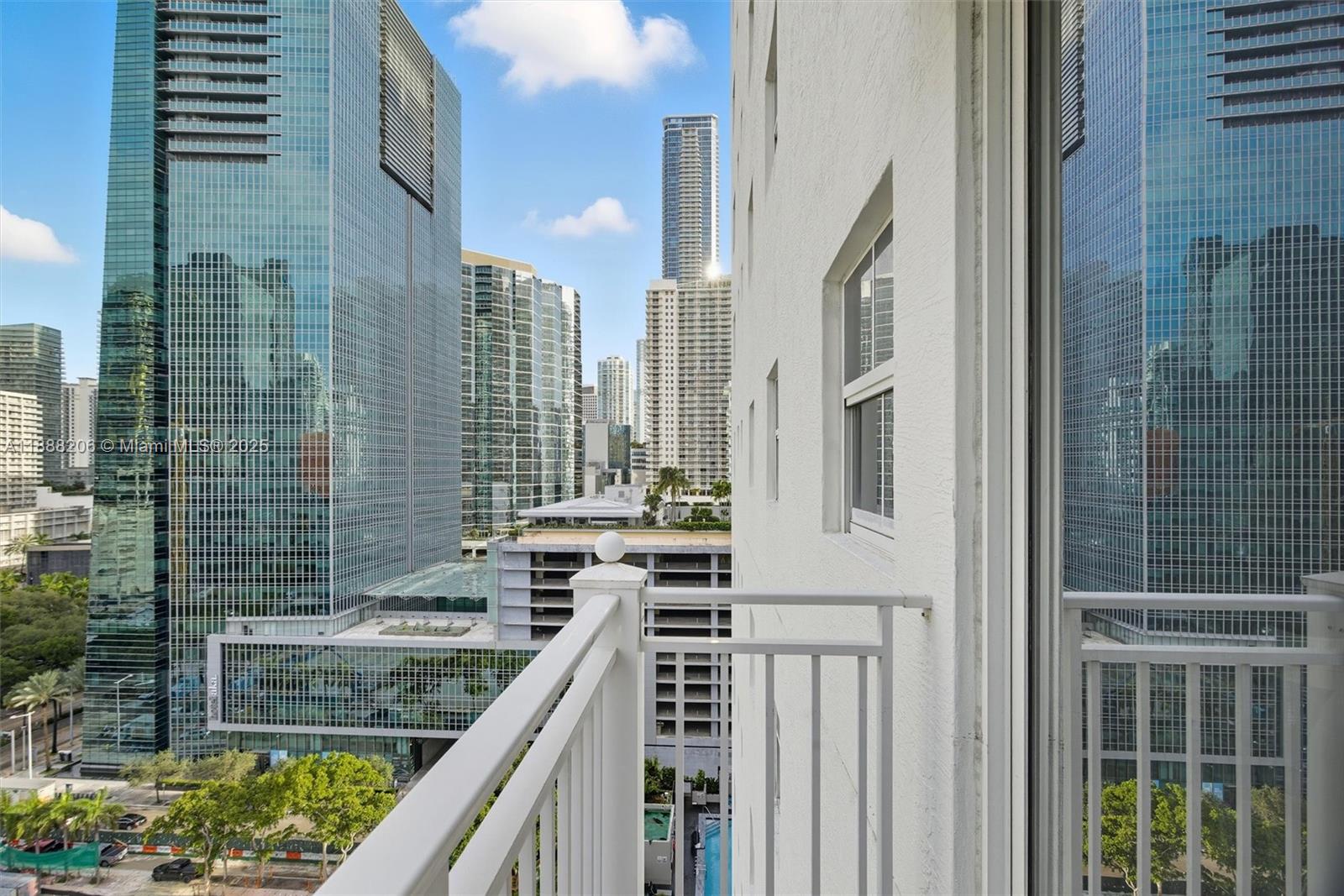 185 Southeast 14th Terrace, Unit 1709 Miami, FL 33131 - Photo 15 of 31 a view of balcony with a couple of cars parked in front of door