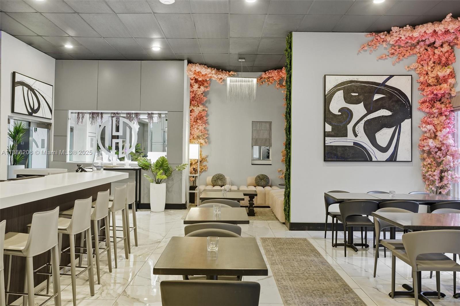 185 Southeast 14th Terrace, Unit 1709 Miami, FL 33131 - Photo 25 of 31 a living room with furniture and wooden floor