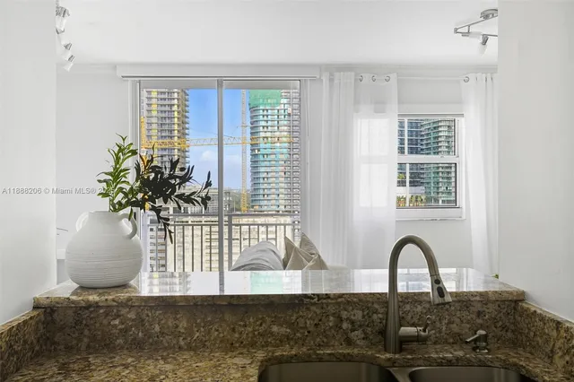 a view of a potted plant in a living room