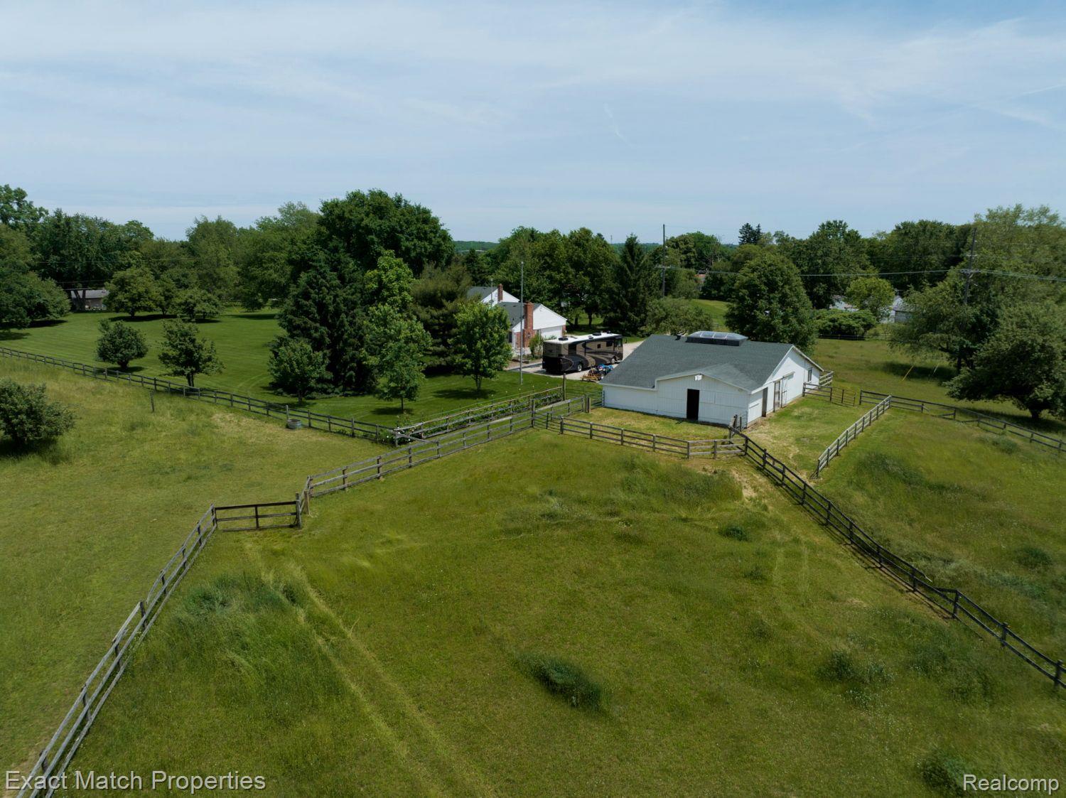 2980 East Rose Center Road Highland, MI 48356 - Photo 10 of 72 Gorgeous property with wooded borders