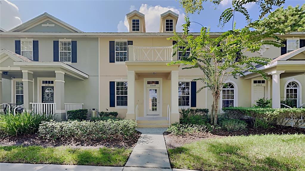 5597 Somersby Road Windermere, FL 34786 - Photo 1 of 1 front view of house with a yard