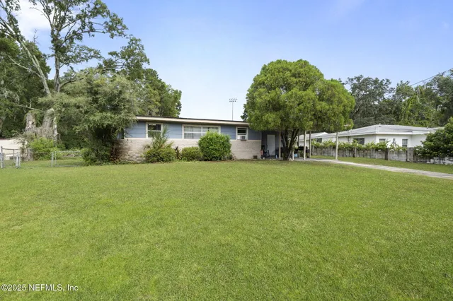 a house view with a garden space