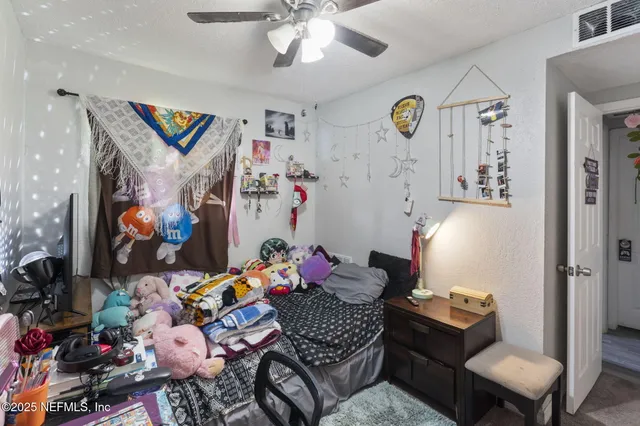 an aerial view of residential house with outdoor space and lake view