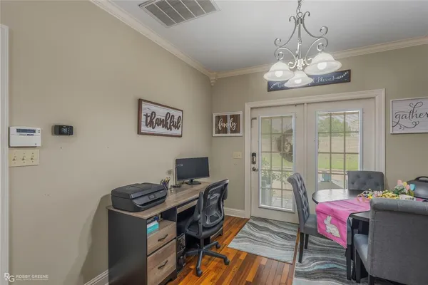 a view of livingroom with furniture and wooden floor