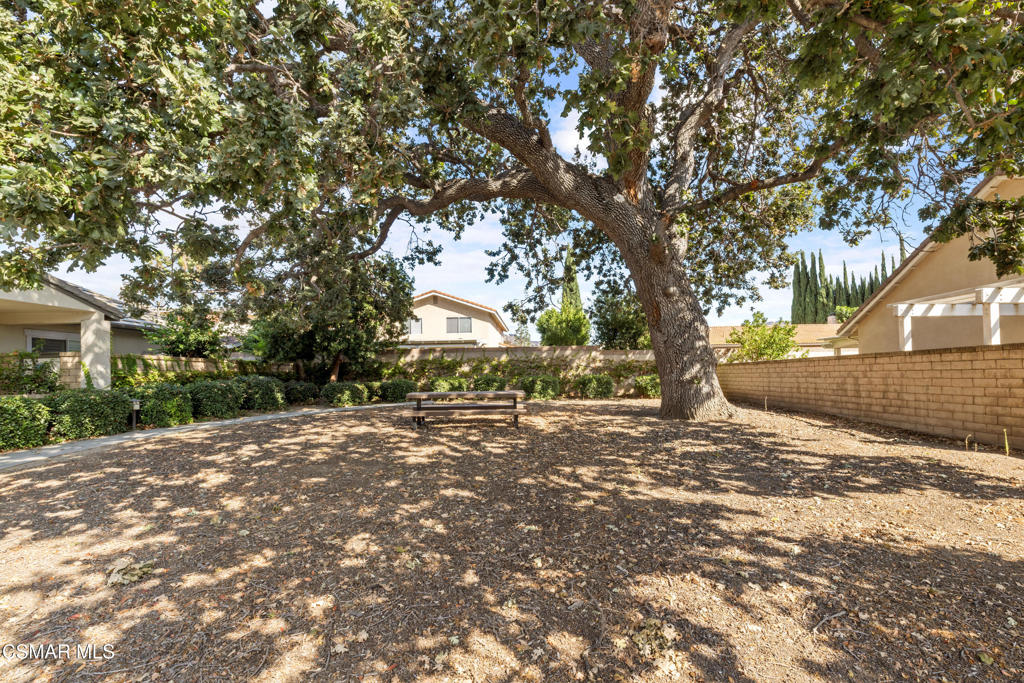 5657 Pansy Street Simi Valley, CA 93063 - Photo 30 of 32 a view of a yard with a tree