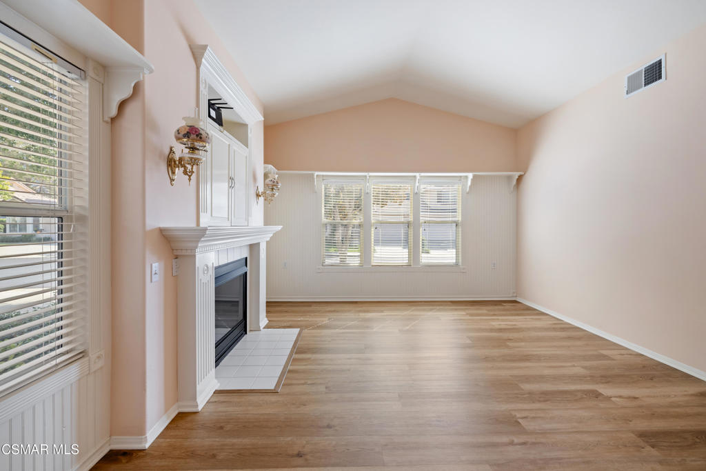 5657 Pansy Street Simi Valley, CA 93063 - Photo 5 of 32 a view of an empty room with window and fireplace